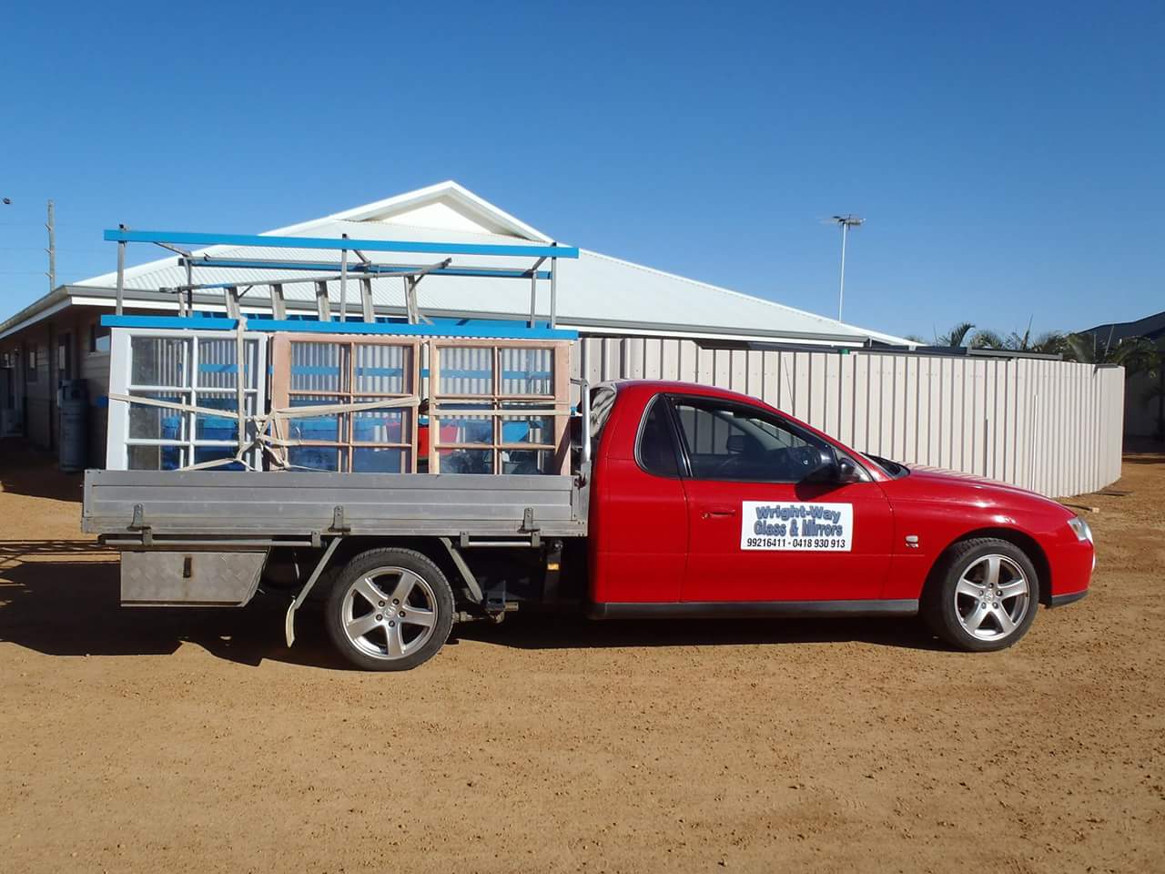 The Wright-Way ute loaded with window frames strapped to its rack